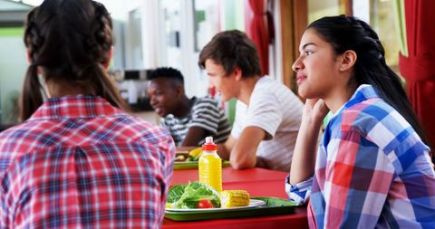 Diverse Students Enjoying Lunch Break in School Cafeteria - Download Free Stock Images Pikwizard.com