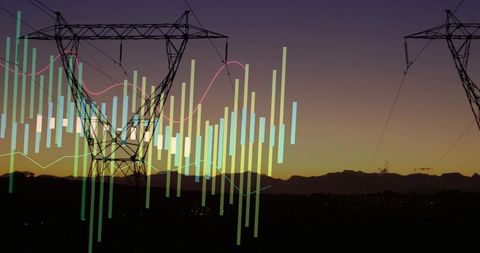 Power transmission tower silhouetting at sunset over mountains with energy data overlay