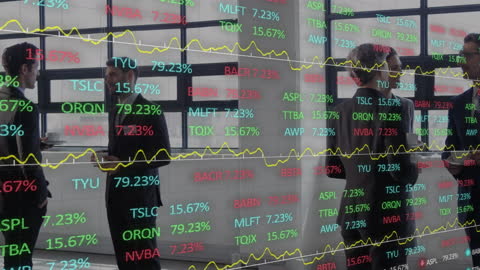 Business Team Analyzing Stock Market Trends in Office