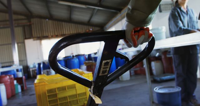 Worker Operating Pallet Jack in Industrial Warehouse - Download Free Stock Images Pikwizard.com