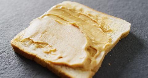 Creamy Peanut Butter Spread on Toast Slice - Download Free Stock Images Pikwizard.com