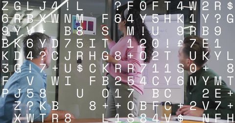 Diverse Colleagues Exploring Digital Interface in Office