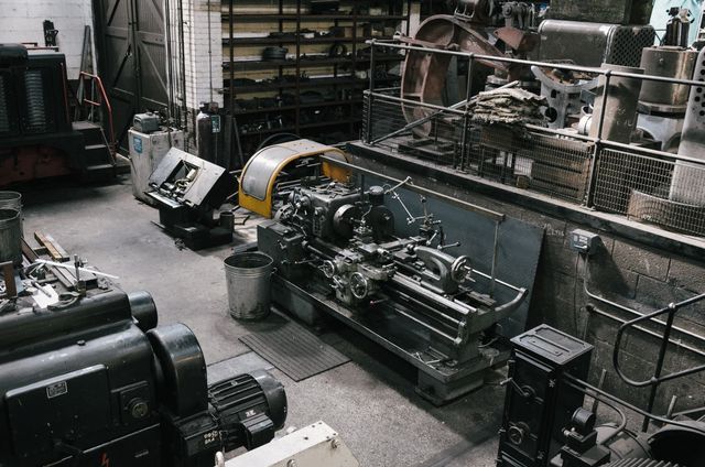 Overhead View of Heavy Machinery in an Industrial Workshop - Download Free Stock Images Pikwizard.com