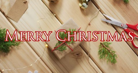 Christmas gift wrapping with festive elements and text