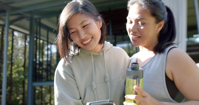 Friends Exercising Outdoors and Sharing a Laugh - Download Free Stock Images Pikwizard.com