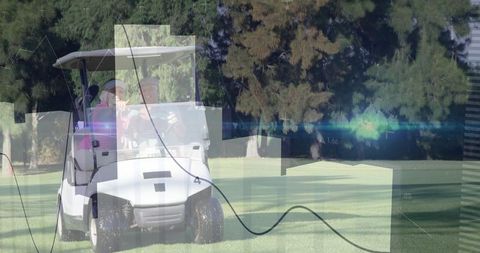 Eco-friendly golf cart on lush green fairway with happy couple