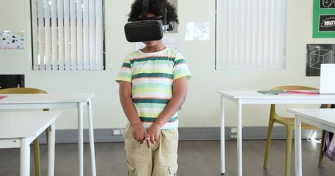 African boy wearing VR headset in classroom exploring virtual reality learning and curiosity