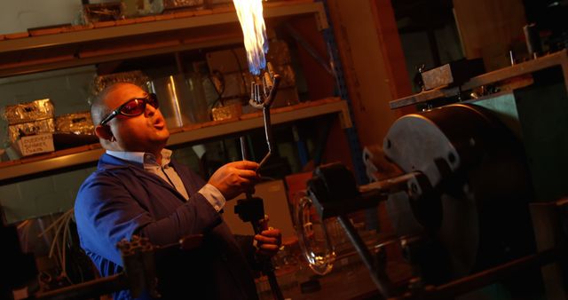 Man Operating Blowtorch in Industrial Workshop with Safety Goggles - Download Free Stock Images Pikwizard.com