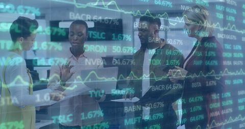 Diverse Team Discussing Stock Market Trends in Modern Office - Download Free Stock Images Pikwizard.com
