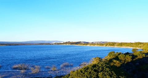 tranquil blue sea with clear sky creating transparent atmosphere - Download Free Stock Videos Pikwizard.com