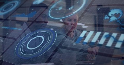 Collaborating professionals using holographic data interface on laptop for analytics