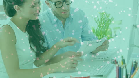 Business Team Discussing Documents with Digital Network Overlay