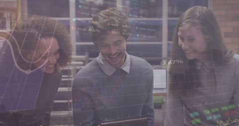 Diverse Team Collaborating with Financial Graphs Overlaid