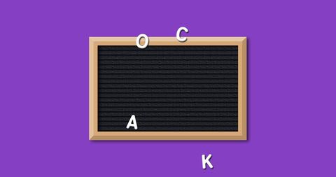 Scattered Alphabet Letters on Blackboard Against Purple Background