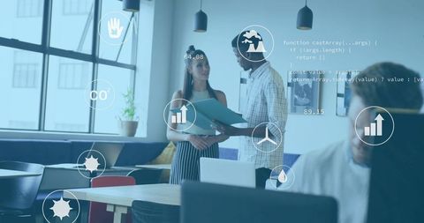 Young Professionals Reviewing Data in Modern Open-Plan Office with Analytics Overlay