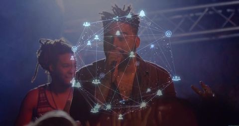 Lead singer performing on smoky live stage with neon augmented reality network overlay