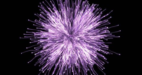 Glowing purple light trails burst in darkness