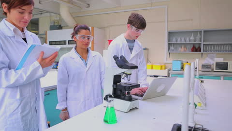 Scientists Researching in Laboratory