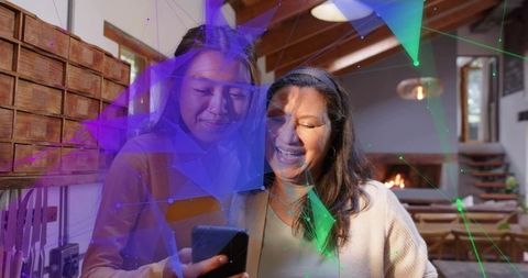Multigenerational women sharing smartphone with holographic digital overlay in warm living room