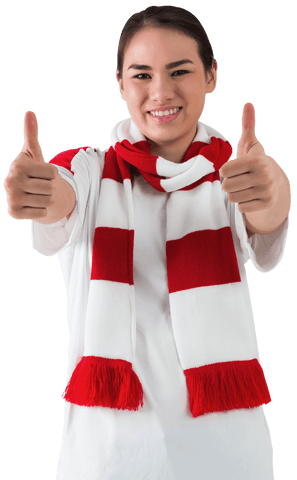 Football Fan in White Outfit Showing Thumbs Up with Red and White Scarf