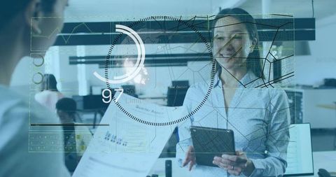 Woman Presenting Data with Tablet in Futuristic Office HUD Overlay Team Leadership
