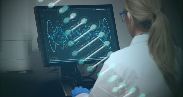 Scientist Analyzing DNA Sequences on Computer in Laboratory - Download Free Stock Images Pikwizard.com