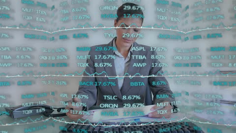 Serious Executive Analyzing Stock Market Trends and Data