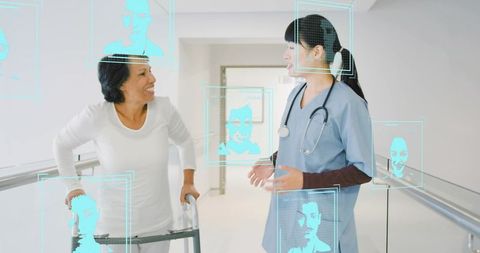 Nurse guiding senior using walker in clinic corridor with holographic health interface