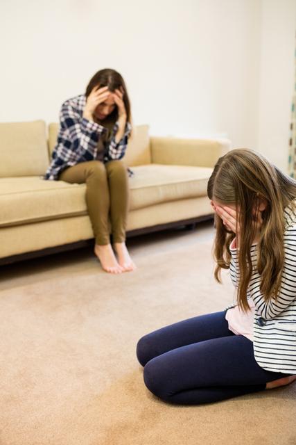 Upset Mother and Daughter in Living Room - Download Free Stock Images Pikwizard.com