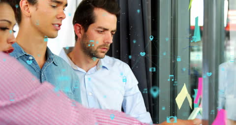 Business Team Analyzing Data with Virtual Graphics