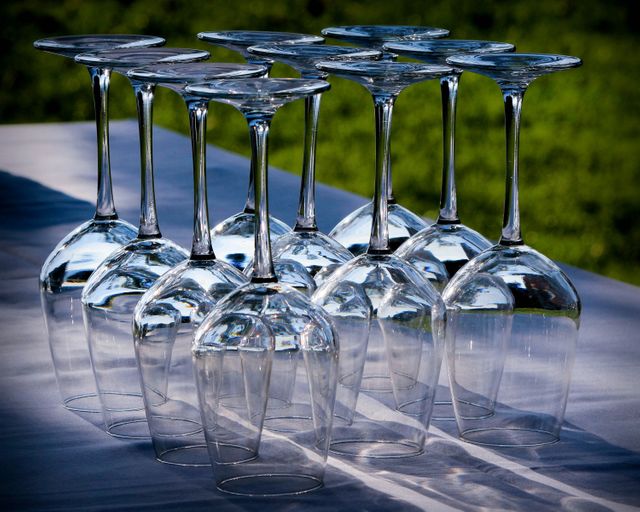 Wine Glasses Arranged Upside Down on Outdoor Table - Download Free Stock Photos Pikwizard.com