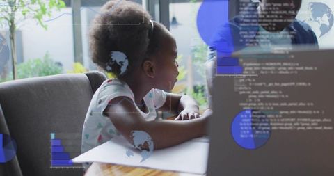 Young girl learning coding with mentor on laptop, collaborating on homework and stem