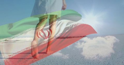 Woman Strolling on Beach with Translucent Iranian Flag Overlay