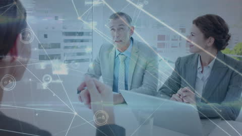 Networking Visuals Over Business Team Using Laptop During Meeting