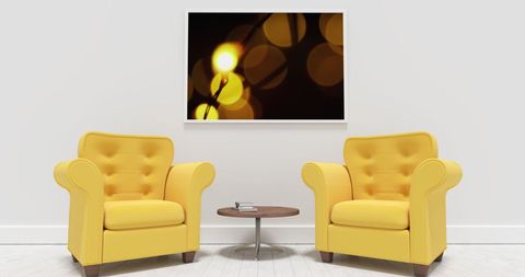 Stylish Interior Living Room with Yellow Armchairs and Artwork - Download Free Stock Images Pikwizard.com