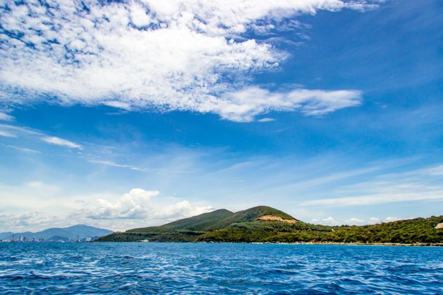 Scenic View of Pristine Island With Clear Blue Sky and Ocean - Download Free Stock Photos Pikwizard.com