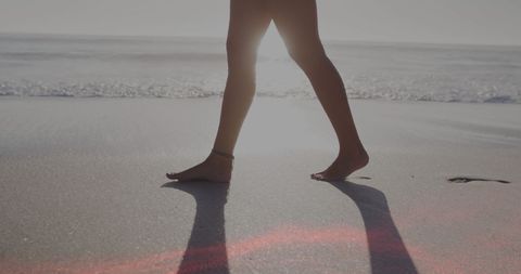 Woman Walking Barefoot on Beach at Sunset - Download Free Stock Images Pikwizard.com