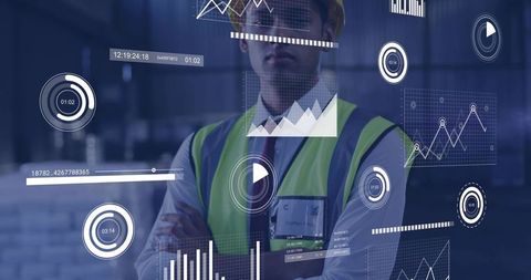 Standing site engineer checking AR HUD dashboards in warehouse for logistics analytics