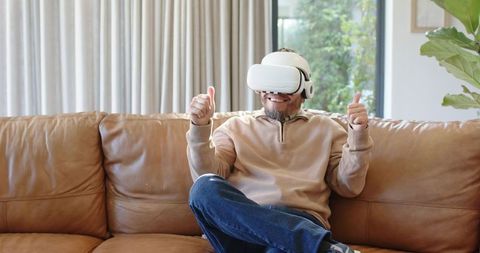 Enthusiastic Asian Man Embracing Virtual Reality Technology