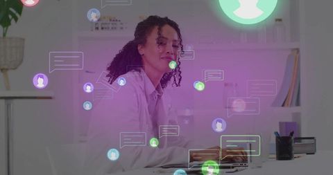 Modern professional typing in digital workspace with chat bubbles