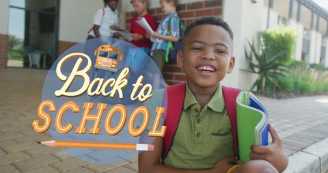 Happy schoolboy with backpack holding notebooks for back to school