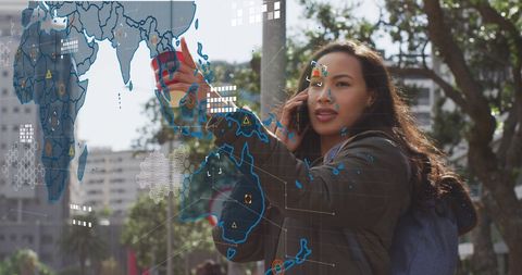 Businesswoman Engaging with Digital Interface Overseas