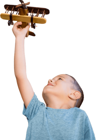 boy holding transparent vintage wooden toy airplane with joy - Download Free Stock Videos Pikwizard.com