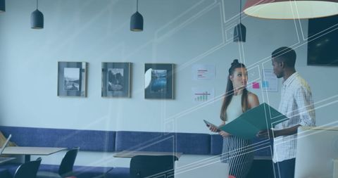 Business Team Collaborating on Financial Data Analysis in Modern Office