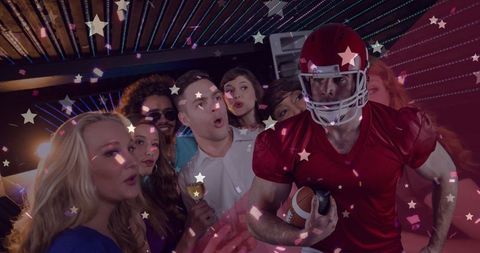 Energetic Bar Gathering with Soccer Star and Friends Celebrating