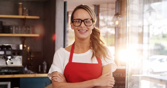 Friendly Barista in Red Apron at Coffee Shop Entrance - Download Free Stock Images Pikwizard.com