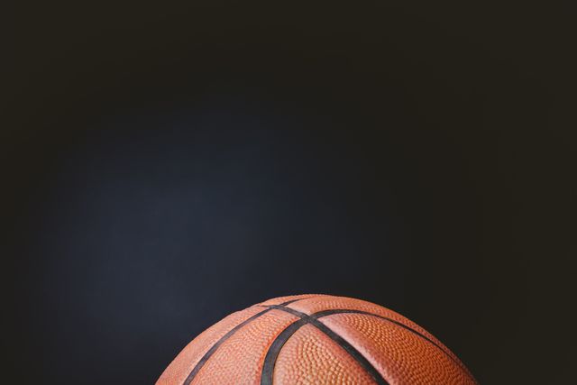 Close Up of Basketball on Black Background - Download Free Stock Photos Pikwizard.com