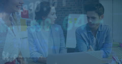 Team Discussing Strategies with Financial Data Visualization