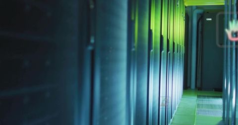 Glowing Data Center Aisle with Cyan Server Racks, Floor Grates and Conduits