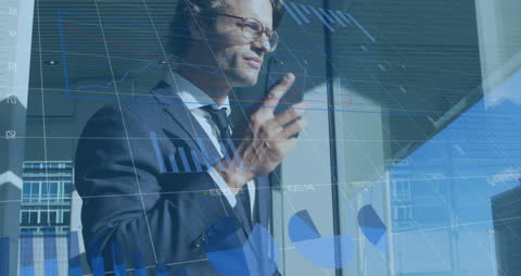 Businessman Analyzing Financial Data with Digital Charts